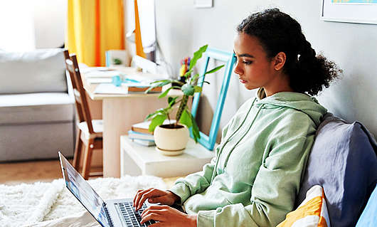 teenager-using-laptop-at-home.jpg